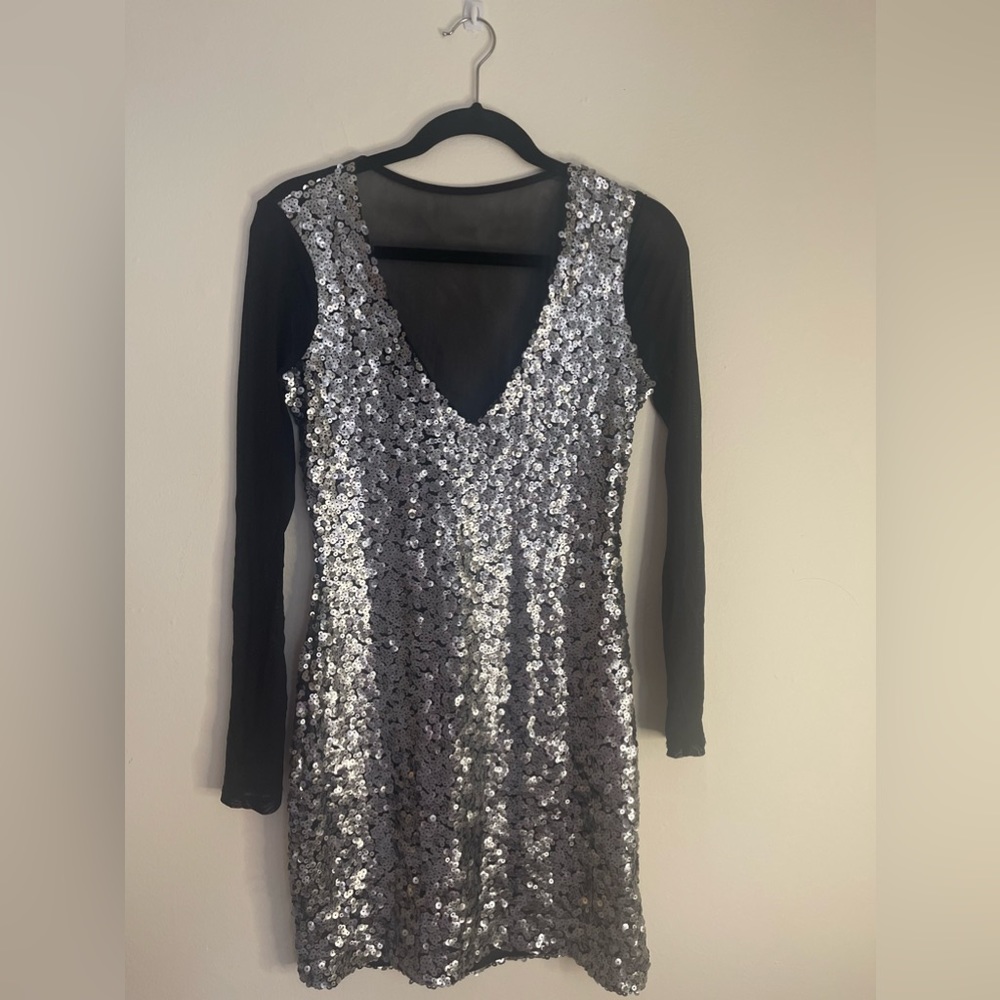 Long sleeve sequin dress.